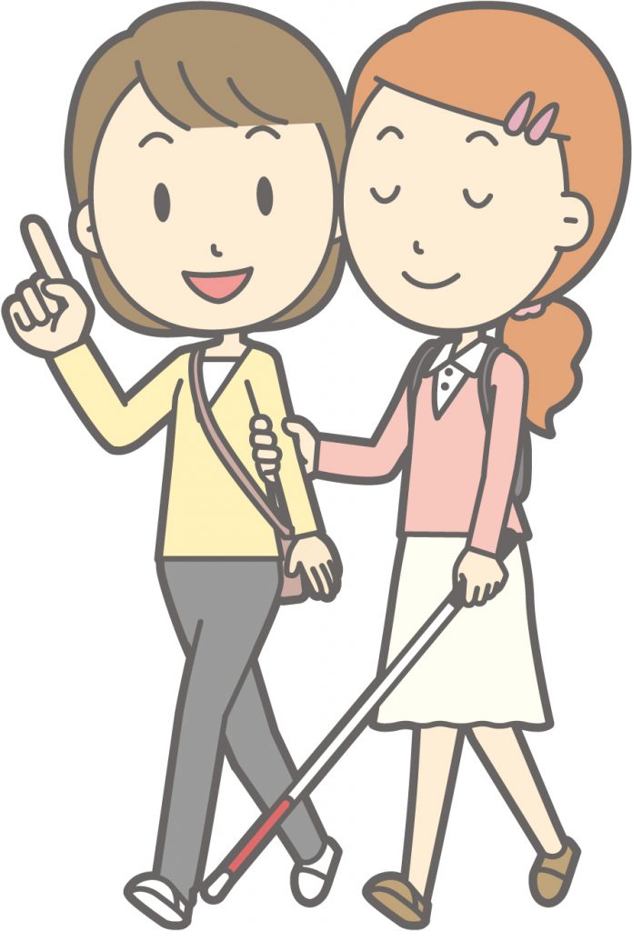 女の人が視覚障害者を誘導している画像